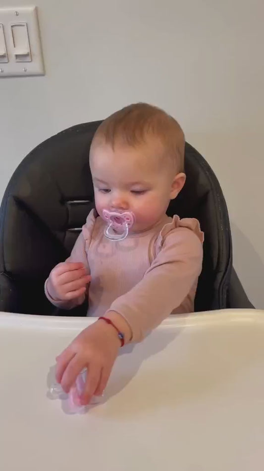 Lyena discovered pacifiers that enable her baby to safely enjoy soft food.